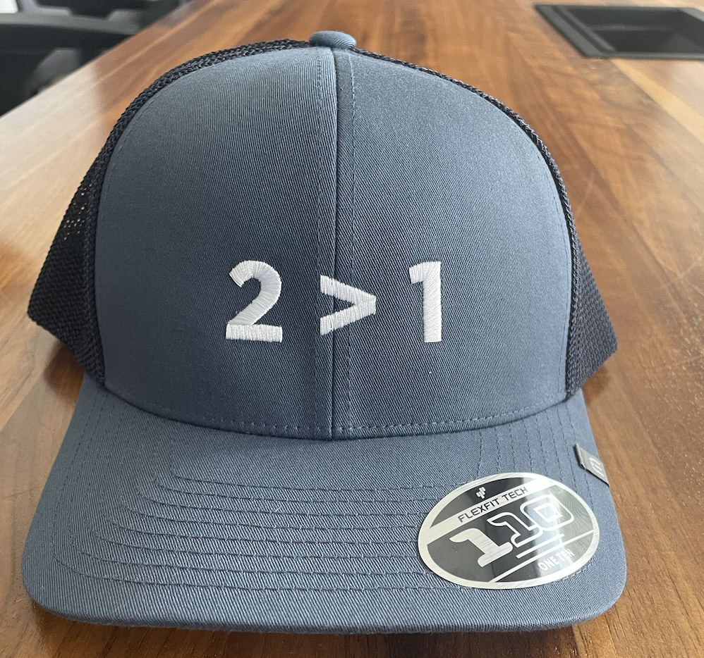 TravisMathew Cruz Trucker Cap | Vintage Indigo